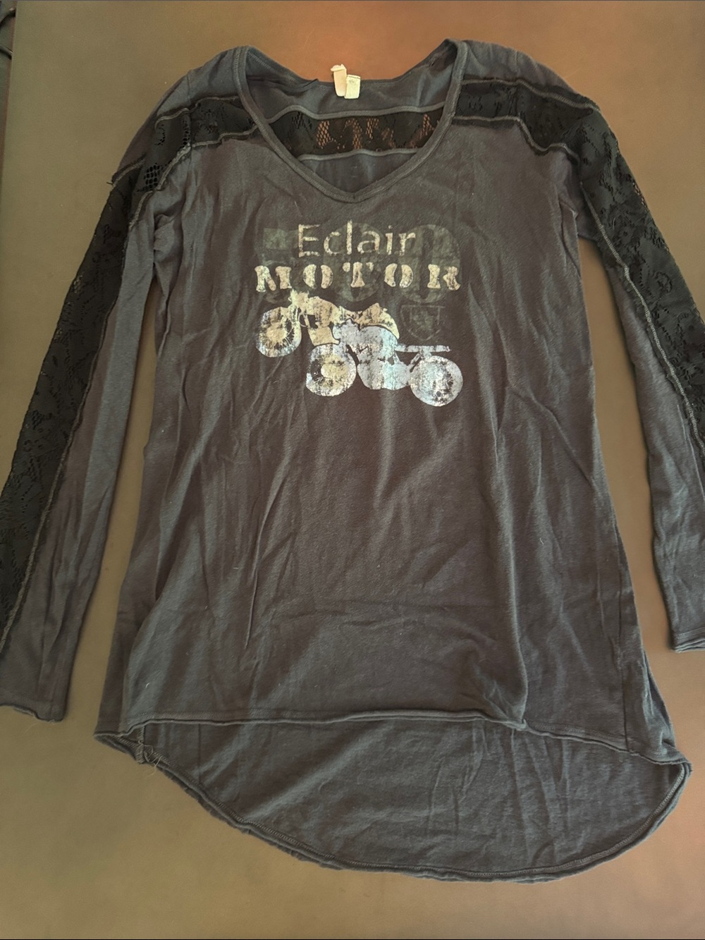 We The Free black tee with metal brand tag